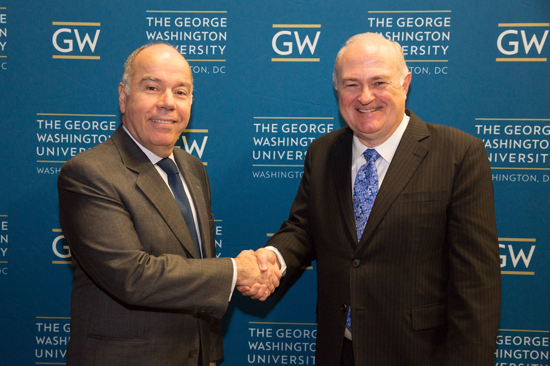 The Brazilian Ambassador & President Knapp shaking hands