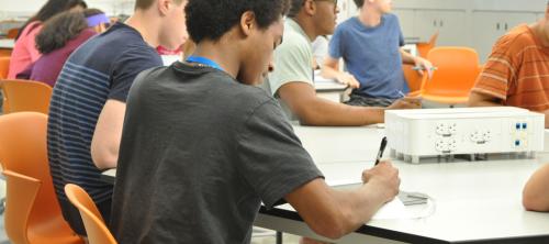 A Pre-College student in a classroom